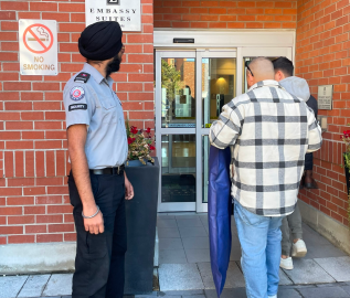 G Force Security Company guard patrolling residential condominium property in Vancouver